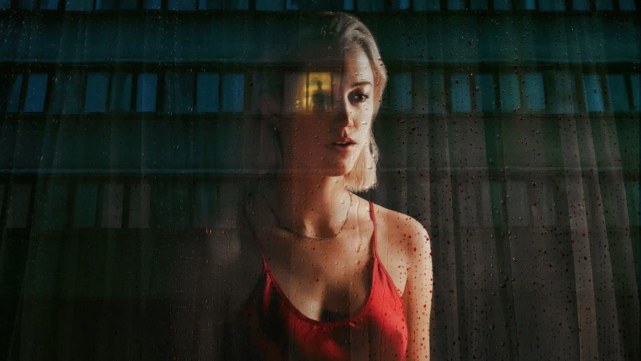 Watcher (2022) backdrop